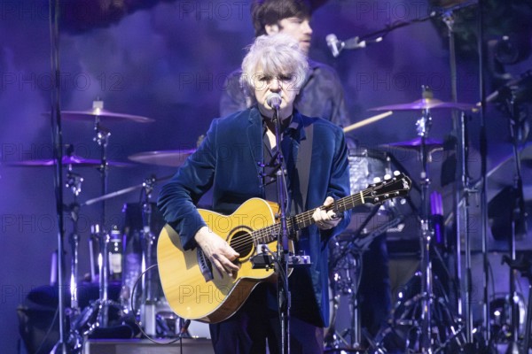 MELBOURNE, AUSTRALIA - DECEMBER 10: Neil Finn of Crowded House performs at Rod Laver Arena on December 10, 2024 in Melbourne, Australia, Oceania