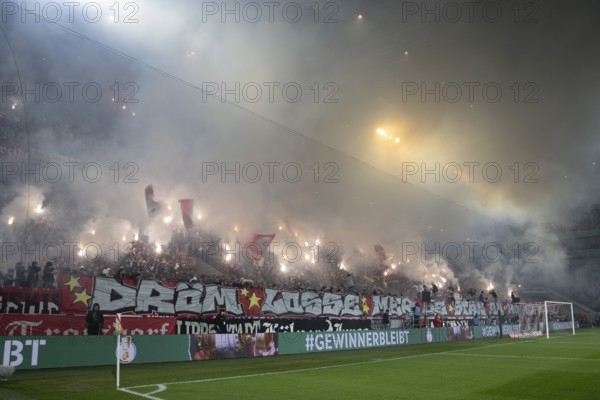 BEAUTIFUL SPORTS/ (DFL/DFB REGULATIONS PROHIBIT ANY USE OF PHOTOGRAPHS AS IMAGE SEQUENCES AND/OR QUASI-VIDEO) Cologne, RheinEnergieStadion, North Rhine-Westphalia, Pyro South Curve, DFB Cup 1.FC Köln, Hertha BSC on 04/12/2024 at RheinEnergieStadion in Cologne Germany