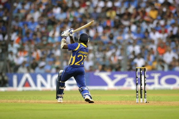 Sri Lankan batsman Mahela Jaywerdena plays shot ICC Cricket World Cup finals Wankhede stadium Mumbai