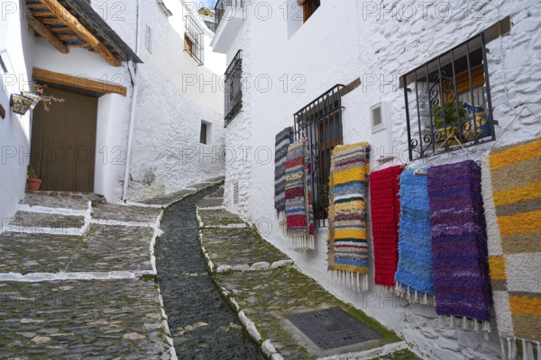 Alpujarras street rugs in Pampaneira of Granada colorful serape