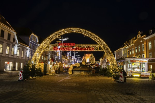 Archway, illuminated entrance to the Christmas market, night shot, main square of Leoben, Styria, Austria, Europe