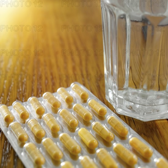 An image of some yellow pills in a blister pack