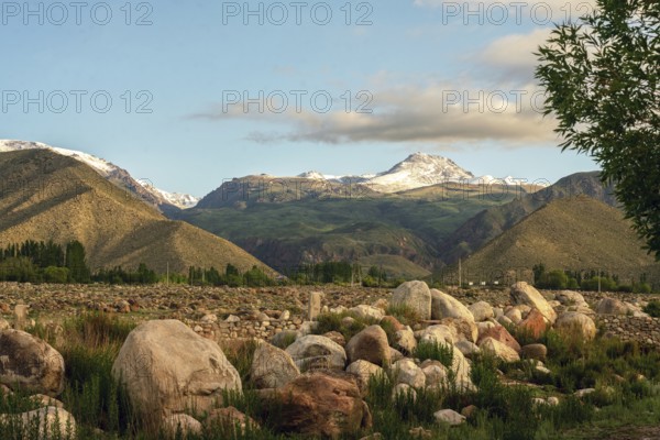 Amazing mountains of Tien Shan (Urumqi) in the north of Lake Issyk-Kul, Look like as on paintings of Rerikh Nikolay. Photo from Petroglyphf place in Cholpan-Ata
