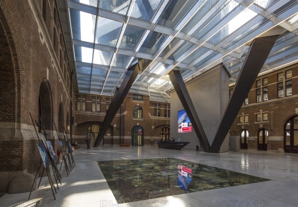 Antwerp, Port House. Port House former fire brigade barracks today port administration extension 2012-16 by Zaha Hadid atrium with walk-in harbour map
