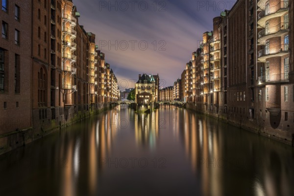 The moated castle in the Speicherstadt, photographed from the Poggemühlenbrücke bridge