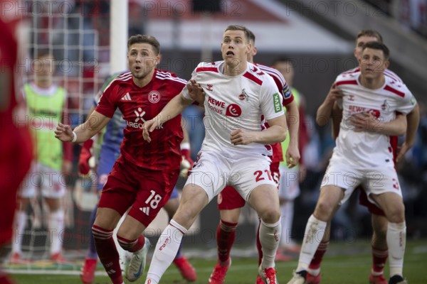 (DFL/DFB REGULATES PROHIBIT ANY USE OF PHOTOGRAPHS AS IMAGE SEQUENCES AND/OR QUASI-VIDEO), RheinEnergieStadion, Cologne, North Rhine-Westphalia, Jona Niemiec (Fortuna Düsseldorf 1895, Attack, #18), Steffen Tigges (1.FC Köln, Storm, #21), 2nd Bundesliga, 1.FC Köln, Fortuna Düsseldorf 1895 on 23/02/2025 at RheinEnergieStadion in Cologne Germany