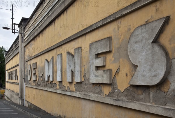 Génelard, factory for mining equipment MATERIEL DE MINES, Art Deco facing wall from around 1930 to cover 19th century factory buildings
