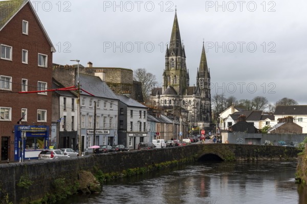 Cork, Ireland, February 25 2023: Urban cityscape of cork city river lee and Fin barre cathedral in Ireland europe, Europe