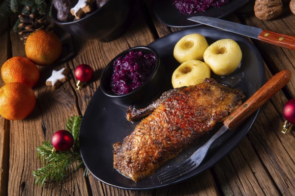 Classic and crispy roast duck with cabbage and dumplings