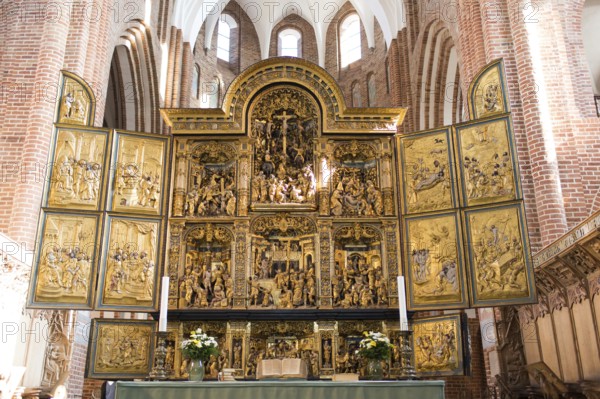 Altar of Roskilde Cathedral in Denmark in sunlight, Roskilde, Denmark, Europe