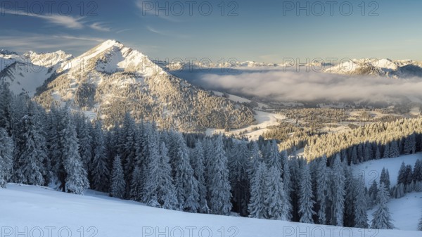 Winter hiking and skiing in the tannheimer valley with fresh snow. Near Oberjoch Pirschling