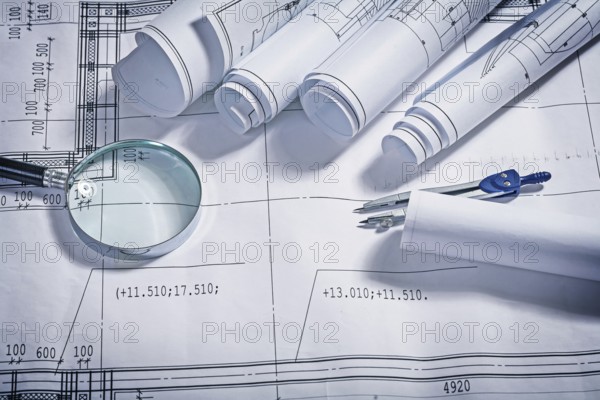Blueprints magnifer and compass close up