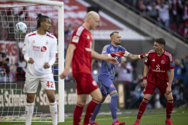 (DFL/DFB REGULATES PROHIBIT ANY USE OF PHOTOGRAPHS AS IMAGE SEQUENCES AND/OR QUASI-VIDEO), RheinEnergieStadion, Cologne, North Rhine-Westphalia, Damion Downs (1.FC Köln, Sturm, #42), Florian Kastenmeier (Fortuna Düsseldorf 1895, Goalkeeper, #33), 2nd Bundesliga, 1.FC Köln, Fortuna Düsseldorf 1895 on 23/02/2025 at RheinEnergieStadion in Cologne Germany