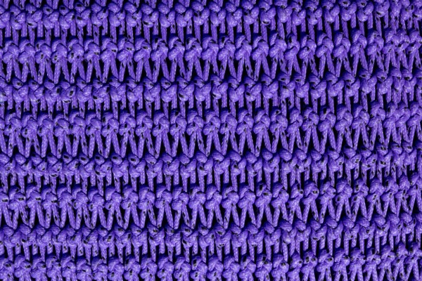 Fishing trawler boat net purple texture with rope knots