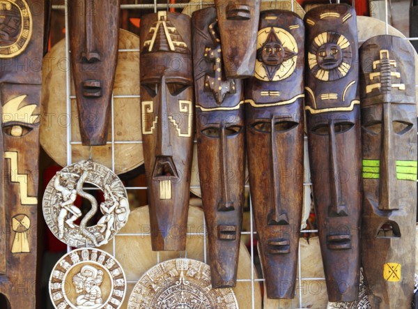 Aztec mayan wooden Mexican indian mask handcrafts in rows