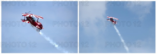 Red plane looping in a blue sky