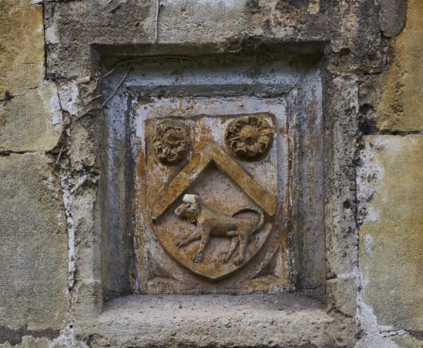 View of coat of arms at a gate, Vicars Close, Wells, Somerset, UK