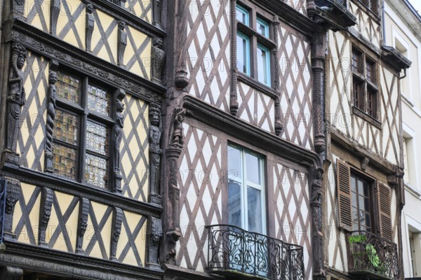 Half-timbered houses with carved figures, Angers, Maine-et-Loire department, Pays de la Loire region, France, Europe