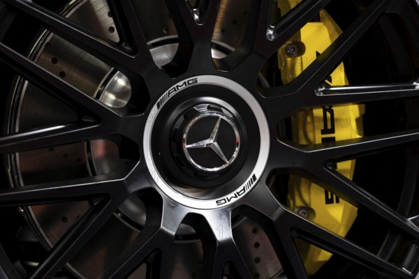 Sofia, Bulgaria - 3 June, 2022: Close-up of Mercedes-Benz logo is seen on a wheel of a car with ventilated ceramic brakes at Sofia Motor Show