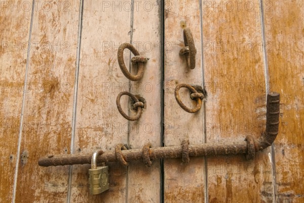 Close-up of traditonal door lock on wooden door in Cartagena, Colombia, South America