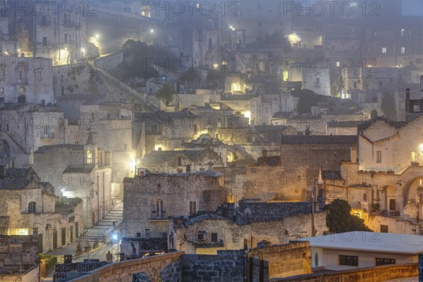 The old town centre of Matera in Italy on a foggy night