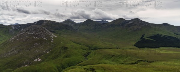 Panorama landscape view of the Twelve Bens mountains in Connemara National Park in County Galway of Ireland