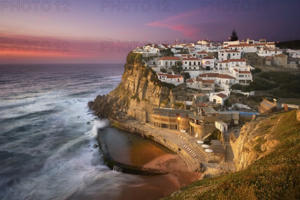 Azenhas do Mar traditional picturesque village in Portugal at sunset