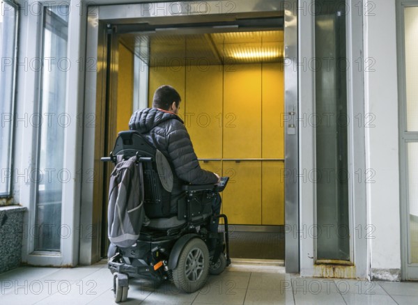 Handicapped male waiting for elevator