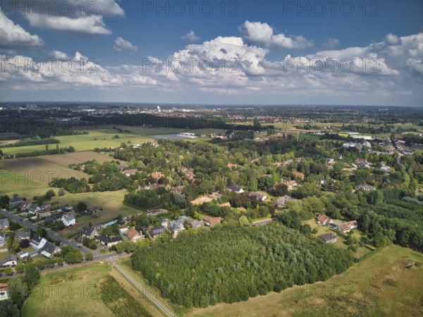 De Pinte, Belgium, August 2020: Aerial view of the suburbs of Ghent in De Pinte, residential area mixed with agriculture, Europe