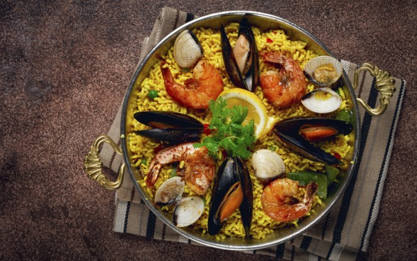 Paella, traditional Spanish dish, seafood paella, top view, homemade, no people