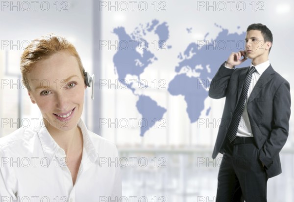 Modern helpdesk office with beautiful woman and handsome businessman