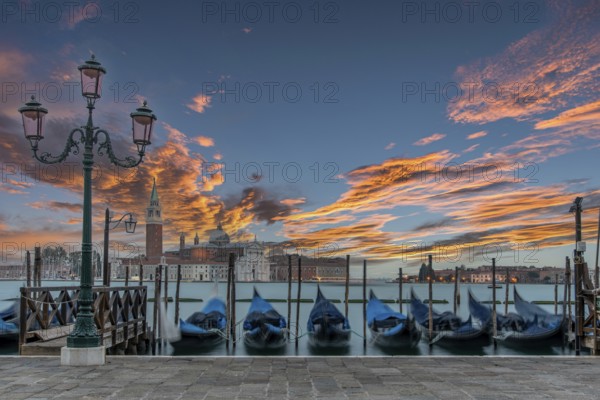 Sunrise over Venice, gondolas moored at Piazza San Marco, Italy, Europe