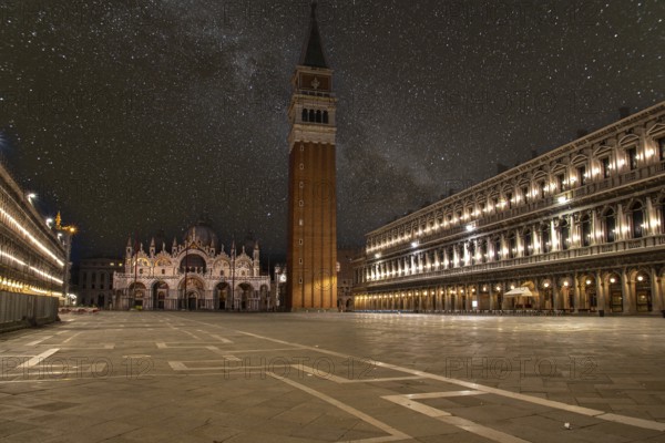 Empty St Marks Square and illuminated Basilica in the early Morning, Venice, Italy, Europe