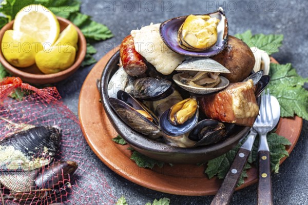 Food, Food, Famous traditional dish of the south of Chile and the Chiloe archipelago, Curanto Kuranto. Different seafood and meat cooked in a pit on the coals under the ground