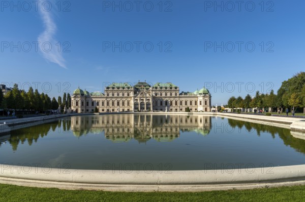 Vienna, Austria, 22 September, 2022: view of the Upper Belvedere Palace in downtown Vienna with reflections in the fountain pool, Europe