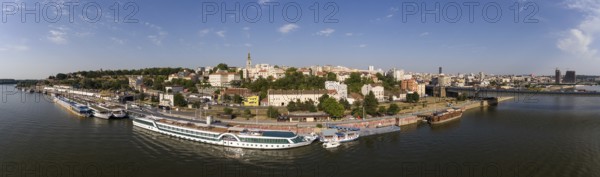 Aerial panorama Belgrade cityscape from Sava river in Serbia at summer evening