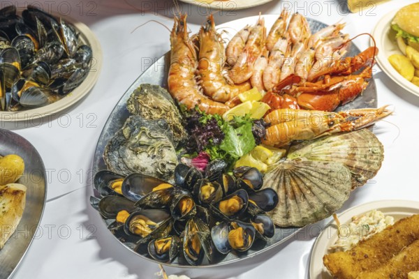 Plate of seafood for sale at a market in Bergen, Norway, Europe