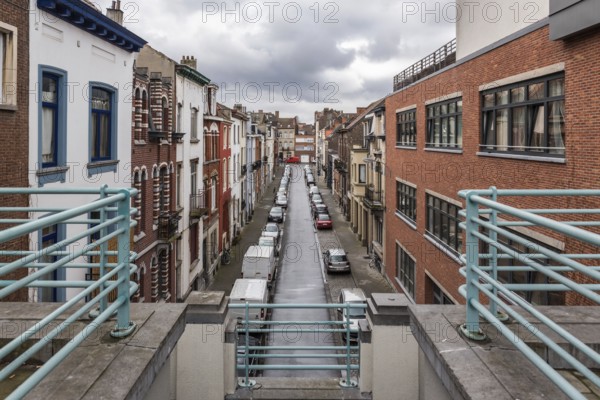 Schaerbeek, Belgium, 03 16 2018: architecture of a dead end residential street with traditional residential houses, Europe
