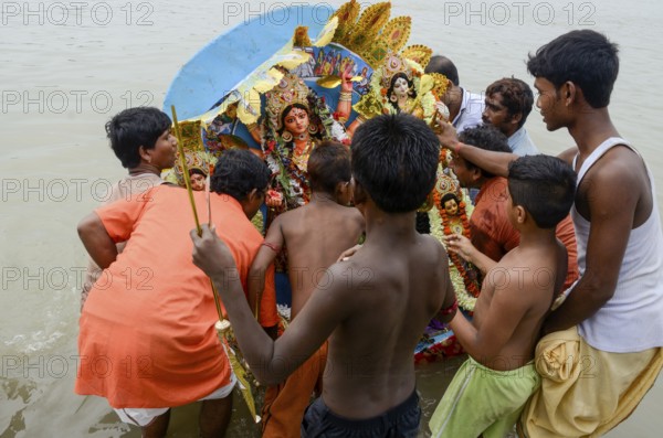 Goddess durga idol immersion at Hooghly river, Kolkata, West Bengal, India, Asia