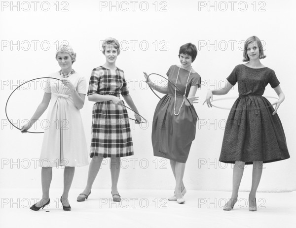 In the 1950s. Women Hula hooping. A craze that culminated during 1958 with some 20 million hula hoop rings sold in less than four months in the USA. Sweden 1958 ref BV18-2