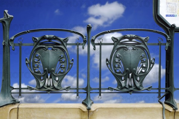 Railing of a Paris metro station with typical floral Art Nouveau elements. Landscape format. Horizontal format
