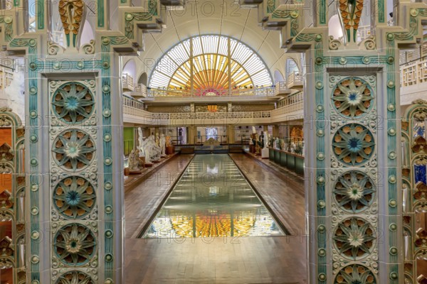 ROUBAIX, FRANCE, JUNE 14, 2024 : interiors Art Deco decors and sculptures of the olympic swimming pool La Piscine, built year 1927 by the Lille architect, Albert Baert