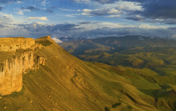 Aerial view of plateau Bermamyt and hills at sunset, North Caucasus mountains, Russia, Europe