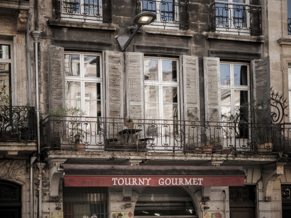 Residential flats sit above a restaurant in a multi use building in Bordeaux, France, Europe