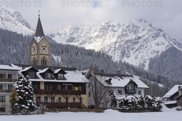 Protestant church with the Dachstein massif behind it