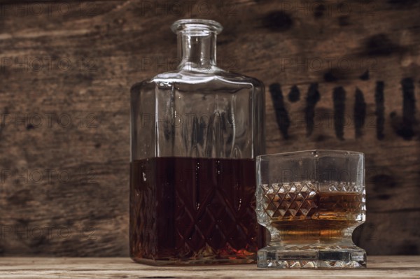 Seasoned brandy into the glasses and decanter vintage style