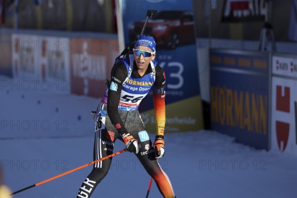 Franziska Preuß (SC Haag) crossing the finish line in the pursuit at the IBU Biathlon World Championships Lenzerheide 2025, Lenzerheide, Switzerland / SUI / CH