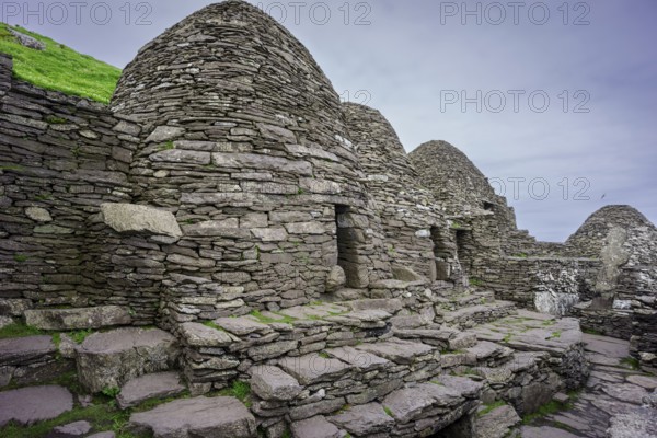 Clochans, stone cells. monastery at the top, Skellig Michael island, Mainistir Fhionáin (St. Fionan?s Monastery), county Kerry, Ireland, United Kingdom, Europe
