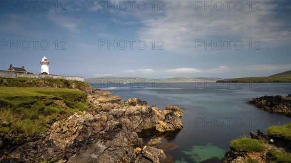 A view of the historic Broadhaven Lighthouse on the Mullet Peninsula in County Mayo in Ireland