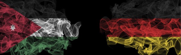Flags of Jordan and Germany on Black background, Jordan vs Germany Smoke Flags